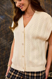 SLEEVELESS VEST BUTTON